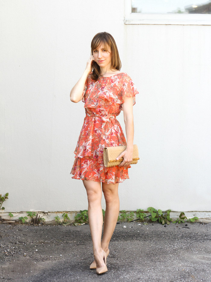 peach dress and silver shoes