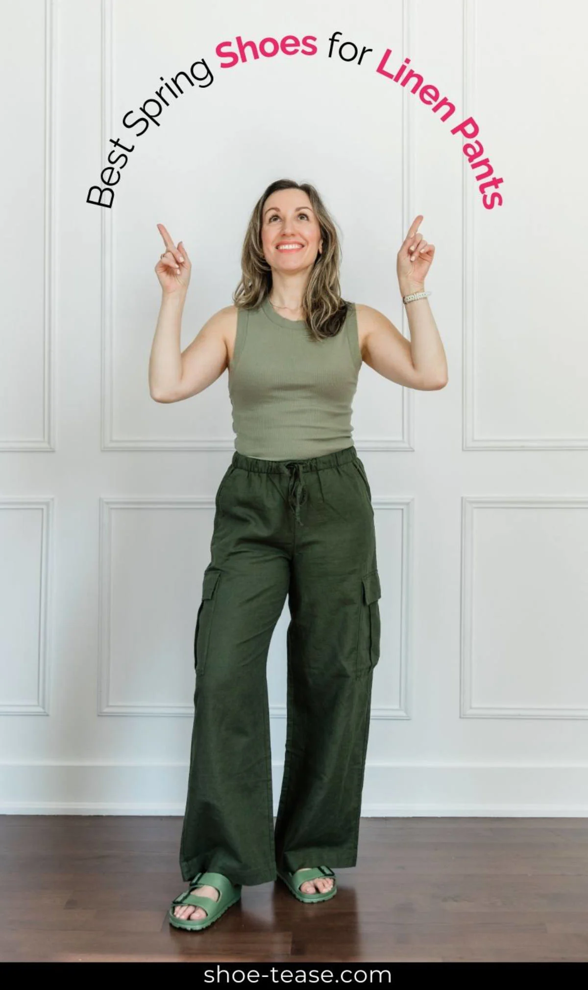 Woman wearing a light green tank top, olive green linen pants and green Birkenstock style sandals, pointing at words reading best spring shoes for linen pants.